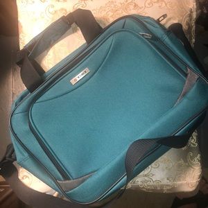 TAG briefcase style bag